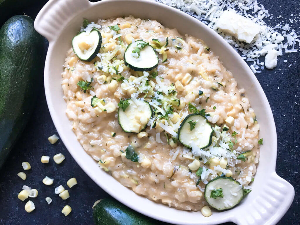 Classic Italian side dish with fresh zucchini and corn. Creamy arborio rice with Parmesan. Gluten free (gf) and vegetarian. Zucchini Corn Risotto with Parmesan Cheese | Three Olives Branch | www.threeolivesbranch.com #risotto #italianrecipe #zucchini #glutenfree #vegetarianrecipe