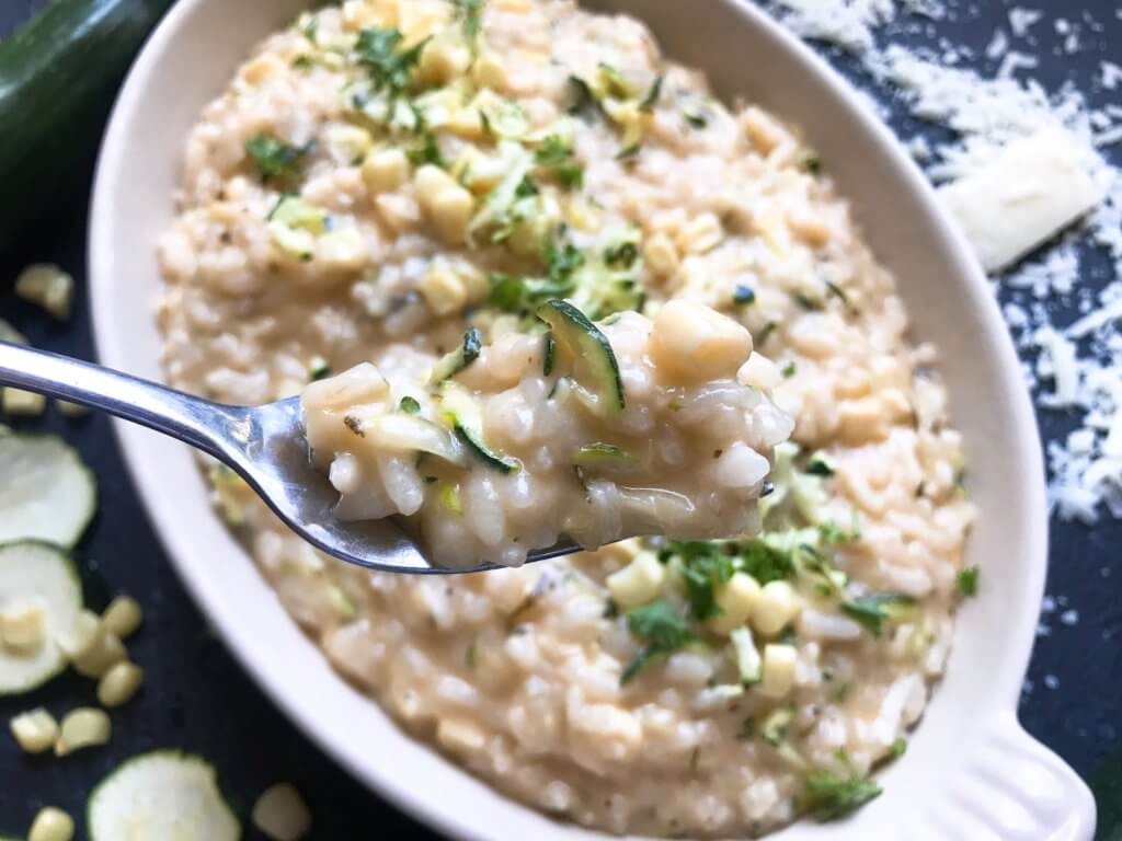 Classic Italian side dish with fresh zucchini and corn. Creamy arborio rice with Parmesan. Gluten free (gf) and vegetarian. Zucchini Corn Risotto with Parmesan Cheese | Three Olives Branch | www.threeolivesbranch.com #risotto #italianrecipe #zucchini #glutenfree #vegetarianrecipe