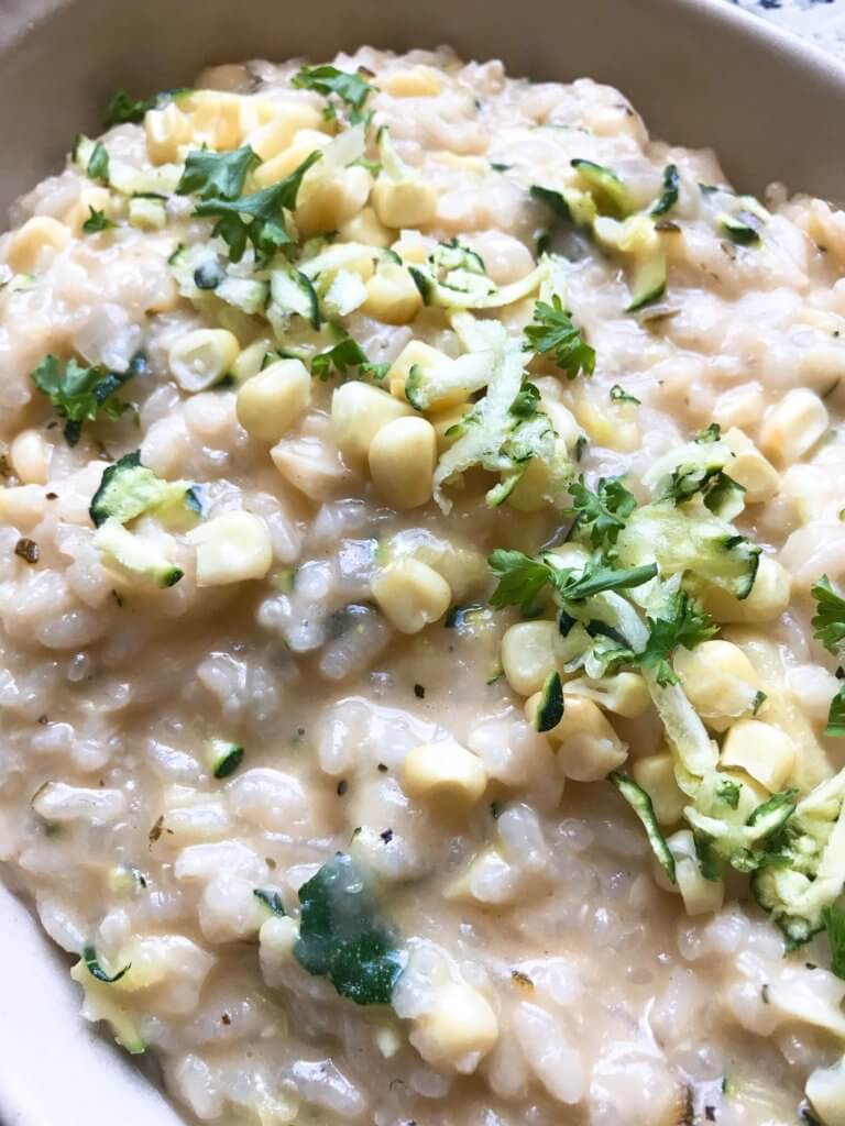 Classic Italian side dish with fresh zucchini and corn. Creamy arborio rice with Parmesan. Gluten free (gf) and vegetarian. Zucchini Corn Risotto with Parmesan Cheese | Three Olives Branch | www.threeolivesbranch.com #risotto #italianrecipe #zucchini #glutenfree #vegetarianrecipe