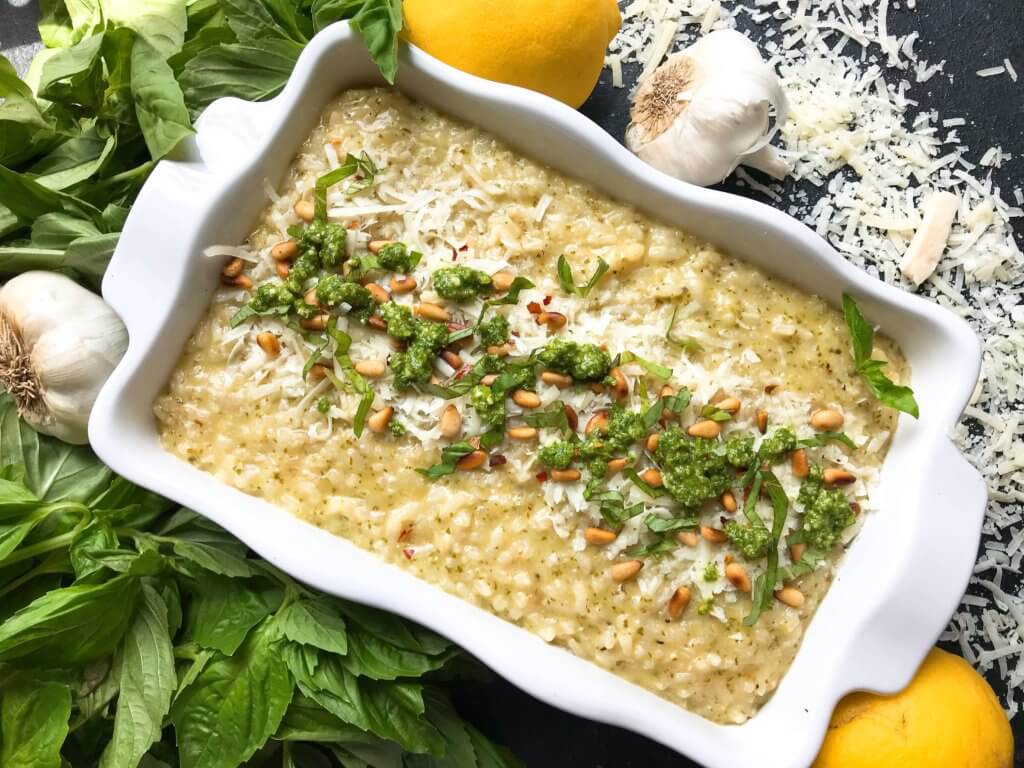 Cheesy Italian Parmesan risotto recipe mixed with fresh basil pesto. Vegetarian and gluten free (GF). Eat on its own, as a side dish, or add your favorite protein. Basil Pesto Risotto | Three Olives Branch | www.threeolivesbranch.com #vegetarianrecipes #risotto #italianrecipes #glutenfree #pesto