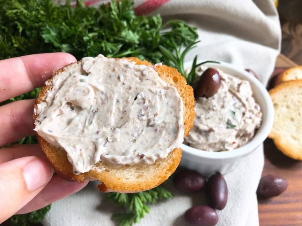 Less than 5 minutes to make a flavored butter recipe. Gluten free (gf) and vegetarian, serve this butter with bread, on chicken, steak, or vegetables for a low carb keto option, or in pasta. Fast and simple, perfect for holiday entertaining and appetizers. Rosemary and Olive Tapenade Compound Butter #compoundbutter #holidayappetizer