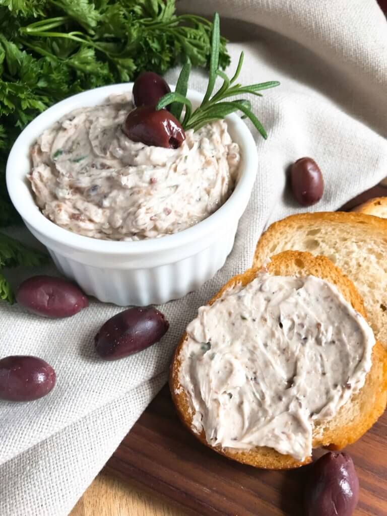 Less than 5 minutes to make a flavored butter recipe. Gluten free (gf) and vegetarian, serve this butter with bread, on chicken, steak, or vegetables for a low carb keto option, or in pasta. Fast and simple, perfect for holiday entertaining and appetizers. Rosemary and Olive Tapenade Compound Butter #compoundbutter #holidayappetizer