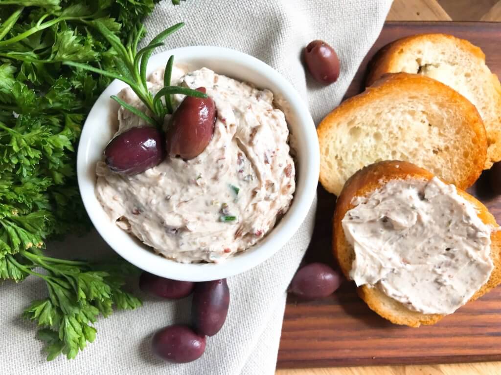 Less than 5 minutes to make a flavored butter recipe. Gluten free (gf) and vegetarian, serve this butter with bread, on chicken, steak, or vegetables for a low carb keto option, or in pasta. Fast and simple, perfect for holiday entertaining and appetizers. Rosemary and Olive Tapenade Compound Butter #compoundbutter #holidayappetizer