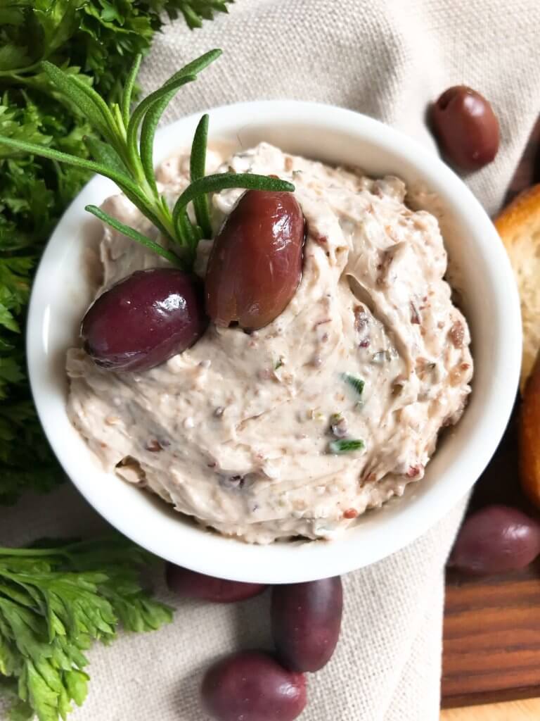 Less than 5 minutes to make a flavored butter recipe. Gluten free (gf) and vegetarian, serve this butter with bread, on chicken, steak, or vegetables for a low carb keto option, or in pasta. Fast and simple, perfect for holiday entertaining and appetizers. Rosemary and Olive Tapenade Compound Butter #compoundbutter #holidayappetizer