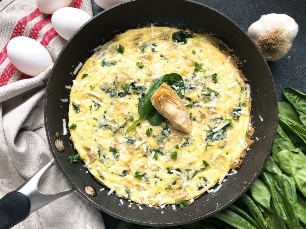 Ready in 20 minutes, this frittata is based off of Spinach Artichoke Dip. Vegetarian, low carb keto, and gluten free (GF) recipe that is simple,. fast, and easy. Great for breakfast or brunch. Spinach, artichoke hearts, and Parmesan cheese. Spinach Artichoke Frittata #breakfastrecipes #brunch #glutenfreerecipes