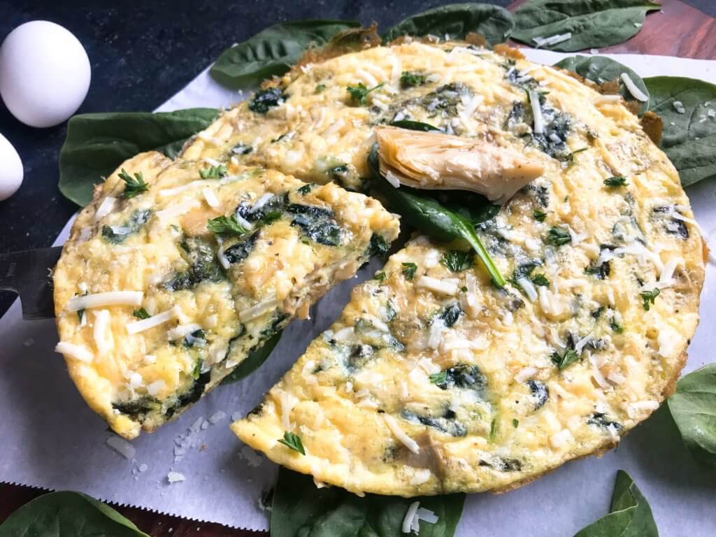 Ready in 20 minutes, this frittata is based off of Spinach Artichoke Dip. Vegetarian, low carb keto, and gluten free (GF) recipe that is simple,. fast, and easy. Great for breakfast or brunch. Spinach, artichoke hearts, and Parmesan cheese. Spinach Artichoke Frittata #breakfastrecipes #brunch #glutenfreerecipes