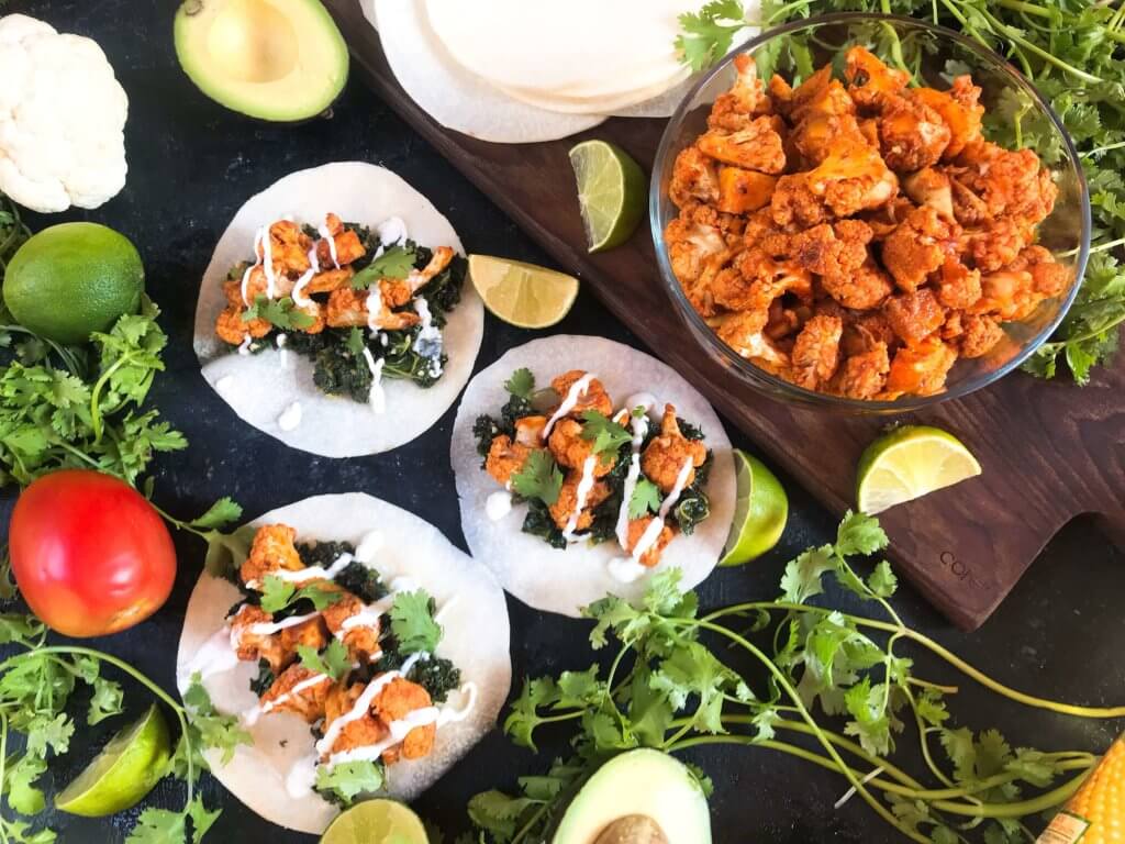 Simple and easy roasted cauliflower taco recipe seasoned with smoked paprika, lime, and Mazola corn oil. Vegetarian, vegan, low carb keto, and gluten free (gf). Fresh and simple Mexican recipe. Smoked Paprika and Lime Cauliflower Tacos #tacotuesday #mexicanrecipes #MakeItMazola #simpleswap #ad