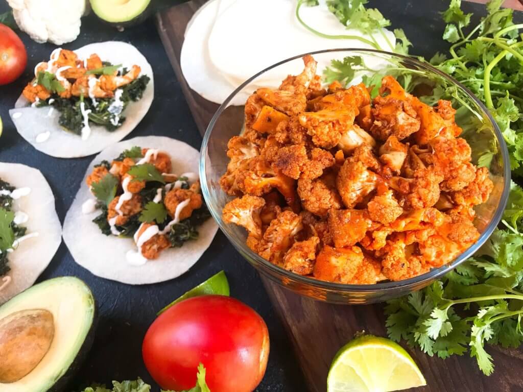 Simple and easy roasted cauliflower taco recipe seasoned with smoked paprika, lime, and Mazola corn oil. Vegetarian, vegan, low carb keto, and gluten free (gf). Fresh and simple Mexican recipe. Smoked Paprika and Lime Cauliflower Tacos #tacotuesday #mexicanrecipes #MakeItMazola #simpleswap #ad