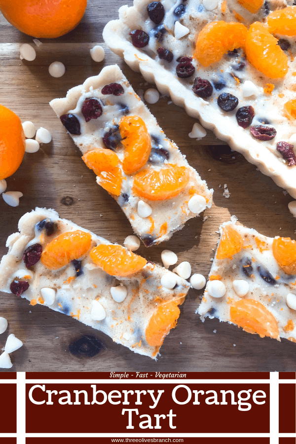 A fast and easy dessert recipe ready in just 30 minutes. Cranberry Orange Tart has a soft cookie shell with a cream cheese filling mixed with dried cranberries, orange zest, and white chocolate chips. #christmasdessert #holidayrecipes #holidaybaking #fruittart