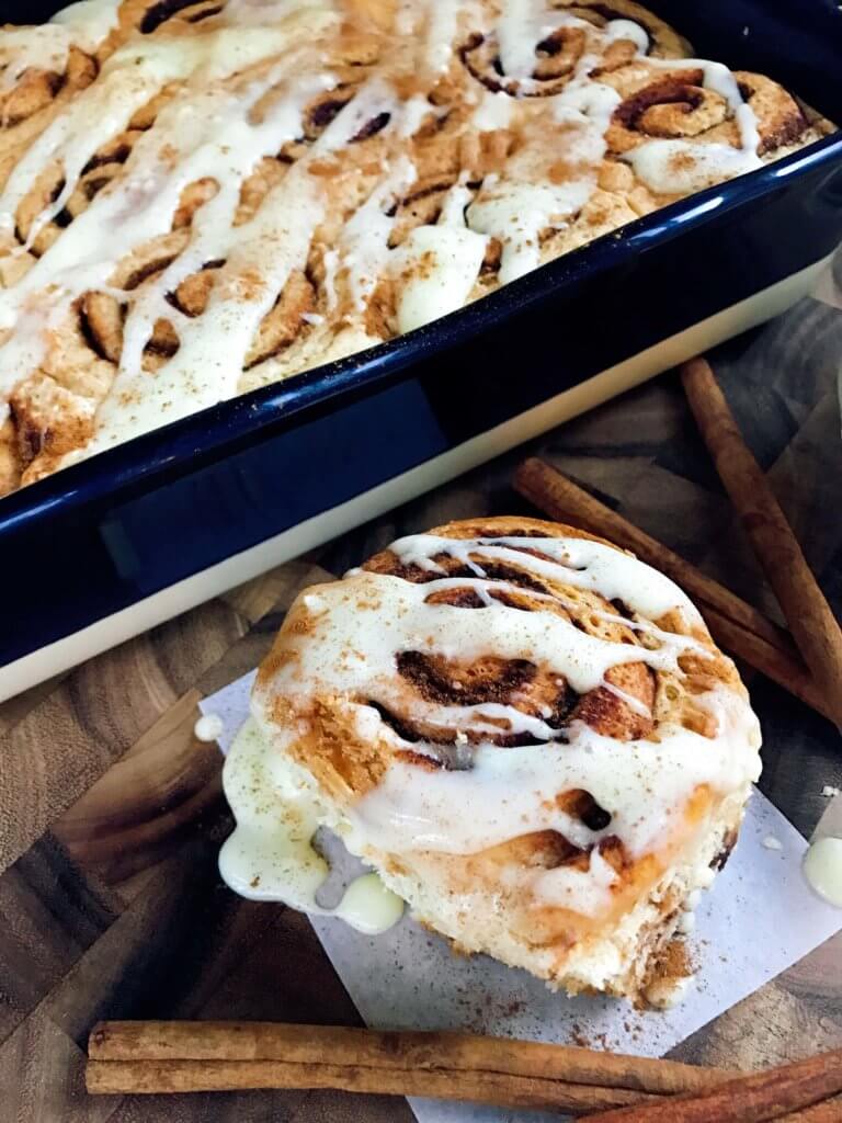 Eggnog Cinnamon Rolls are perfect for Christmas morning! Celebrate winter and the holiday season with a fun breakfast or brunch recipe. Eggnog, cinnamon, and nutmeg flavor these rolls. A great vegetarian food to make in advance. #christmasbrunch #christmasbreakfast #cinnamonrolls #eggnogrecipes #christmasrecipes