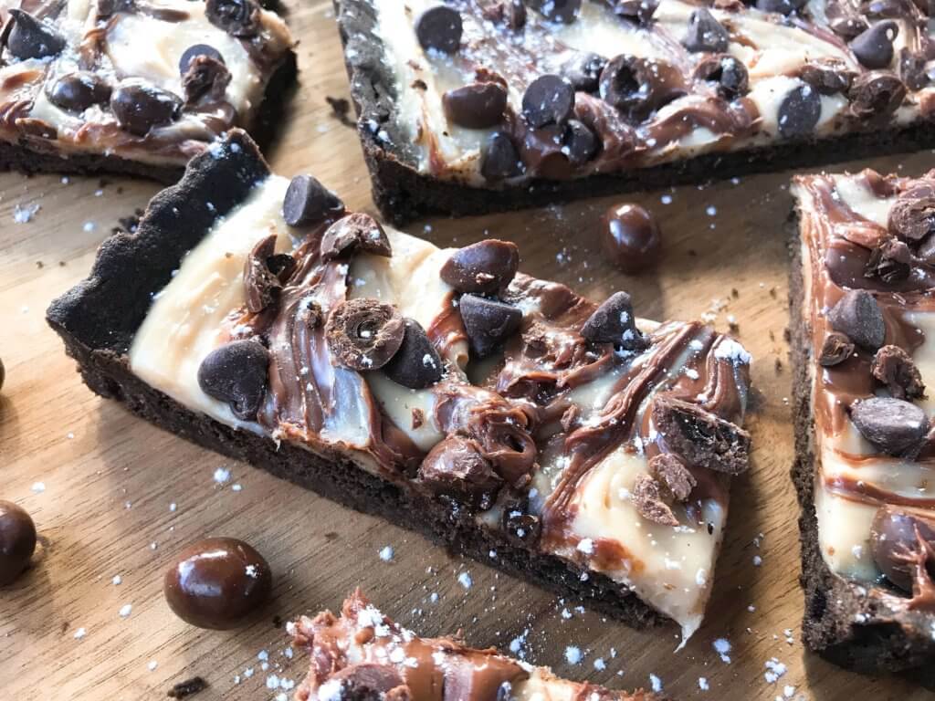 A quick and easy indulgent dessert, this Chocolate Espresso Tart is ready in just 30 minutes. A soft cocoa cookie shell is filled with a coffee cream cheese, Nutella chocolate hazelnut spread, chocolate espresso beans, and chocolate chips. #chocolateespresso #chocolatedesserts #fastdesserts #tartrecipes #chocolaterecipes