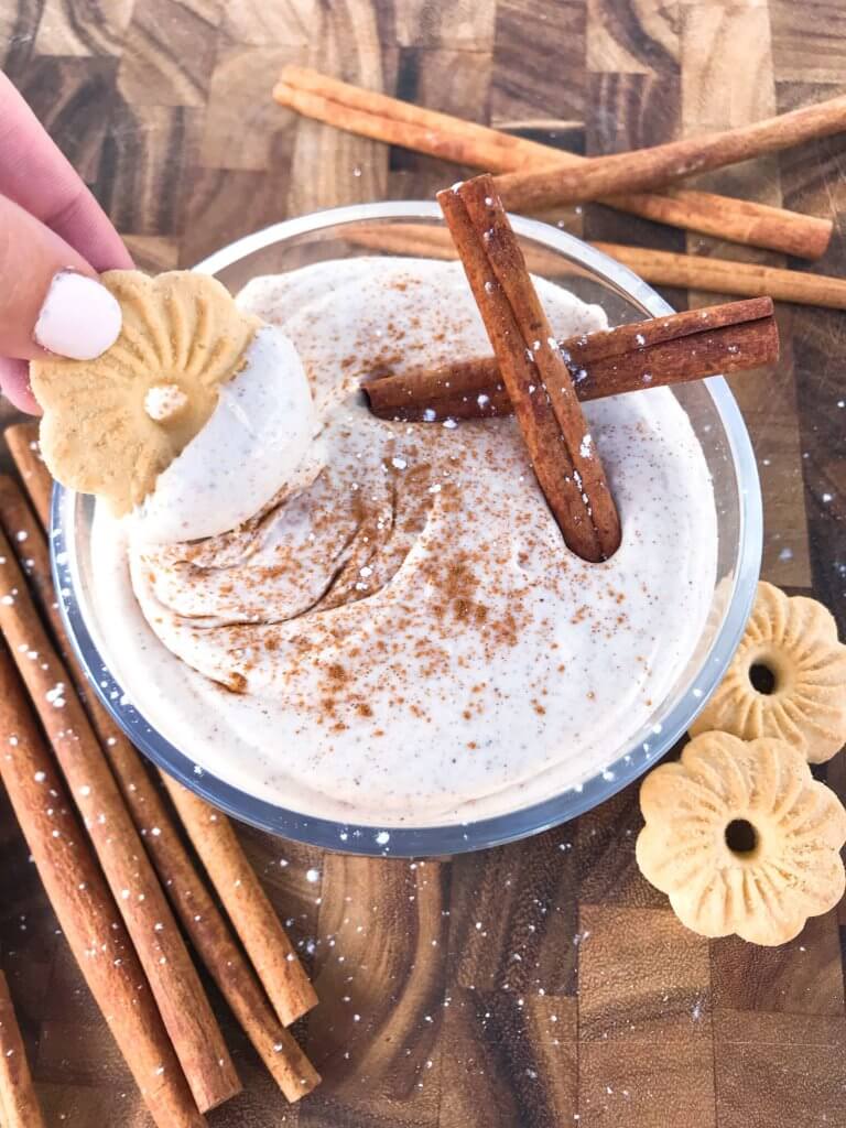 Ready in 5 minutes, this fast and easy holiday dessert is perfect for dunking Christmas cookies. Eggnog Cream Cheese Dip is made with cream cheese, sugar, eggnog, cinnamon, and nutmeg for a simple Christmas dessert. Vegetarian and gluten free. #christmasdessert #eggnog #christmasrecipe