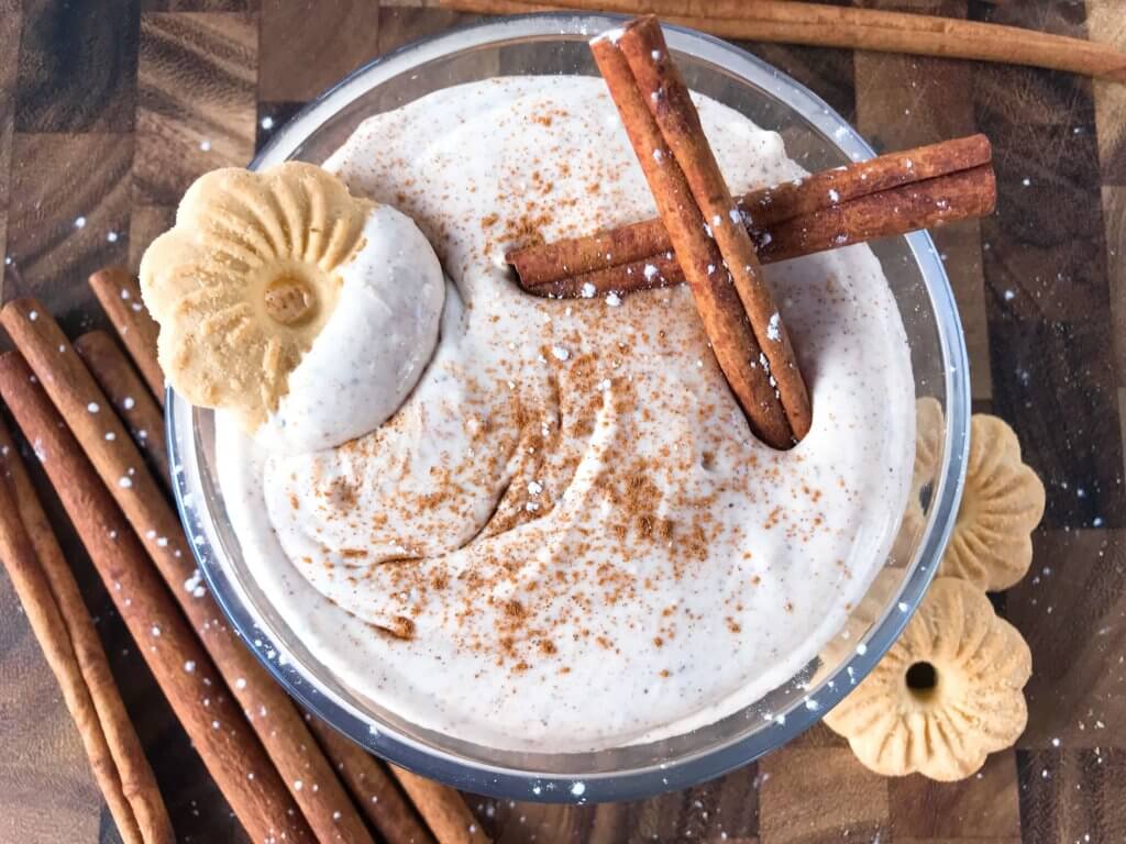 Ready in 5 minutes, this fast and easy holiday dessert is perfect for dunking Christmas cookies. Eggnog Cream Cheese Dip is made with cream cheese, sugar, eggnog, cinnamon, and nutmeg for a simple Christmas dessert. Vegetarian and gluten free. #christmasdessert #eggnog #christmasrecipe