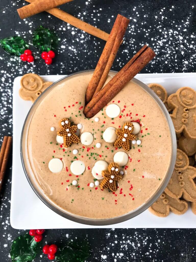 This fast and easy holiday Christmas dessert recipe is ready in 5 minutes. Gingerbread Cream Cheese Dip is gluten free, vegetarian, and flavored with cinnamon, molasses, nutmeg, and ginger. Dunk gingerbread cookies, apples, and pears. #christmasrecipe #holidaydessert #christmasdessert