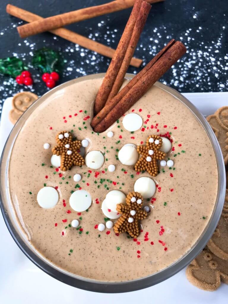 This fast and easy holiday Christmas dessert recipe is ready in 5 minutes. Gingerbread Cream Cheese Dip is gluten free, vegetarian, and flavored with cinnamon, molasses, nutmeg, and ginger. Dunk gingerbread cookies, apples, and pears. #christmasrecipe #holidaydessert #christmasdessert