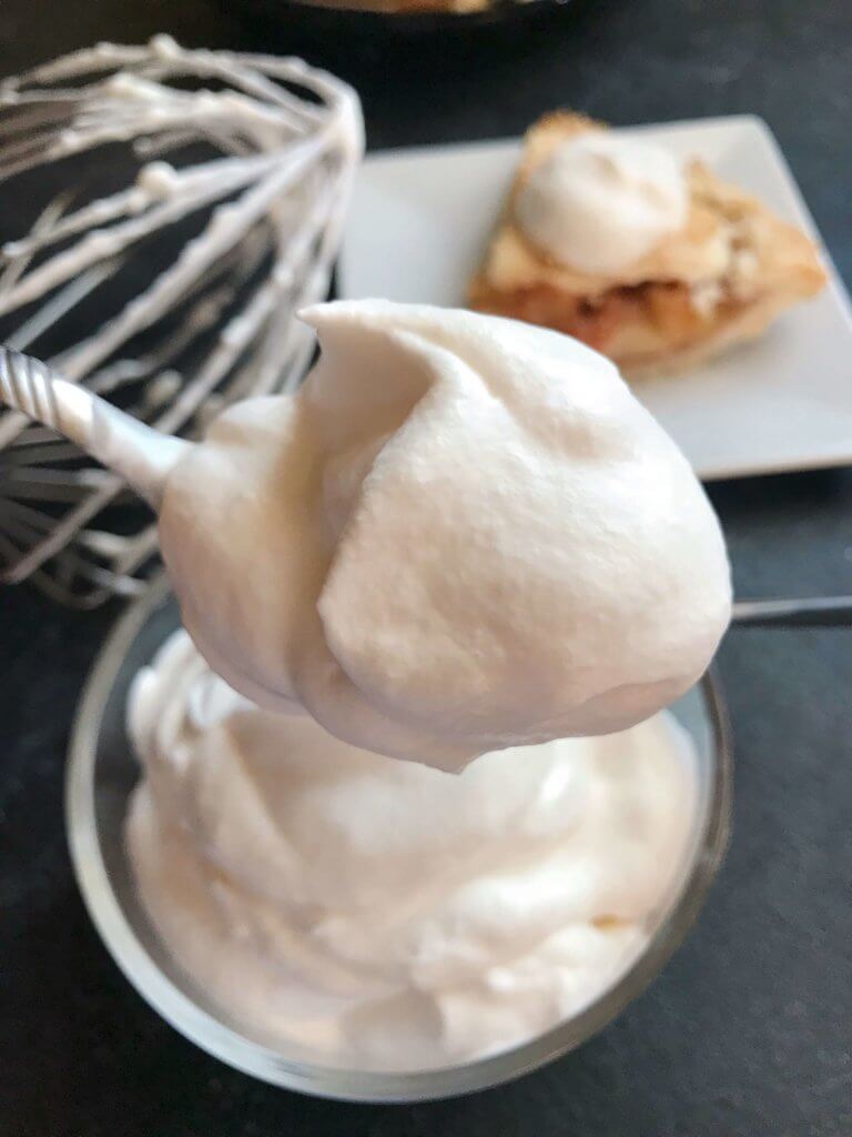 A fast and simple 5 minute whipped cream. Learn How To Make Whipped Cream with just three ingredients for your holiday desserts. #holidaydesserts #easydesserts #whippedcream #whipcream