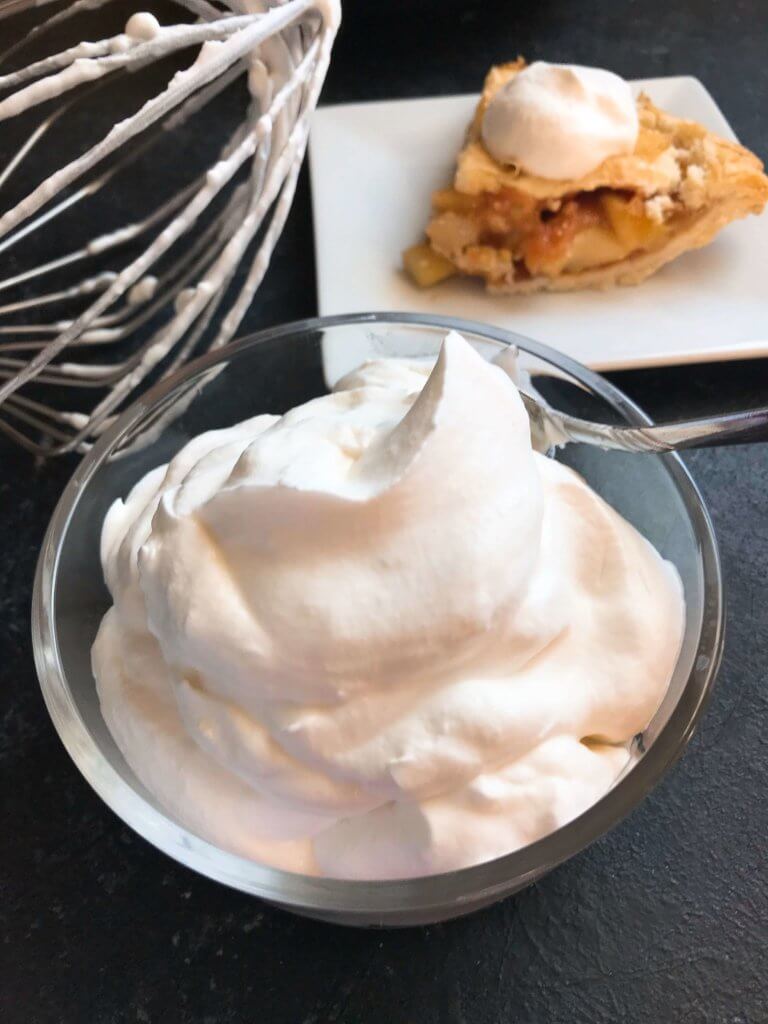 A fast and simple 5 minute whipped cream. Learn How To Make Whipped Cream with just three ingredients for your holiday desserts. #holidaydesserts #easydesserts #whippedcream #whipcream