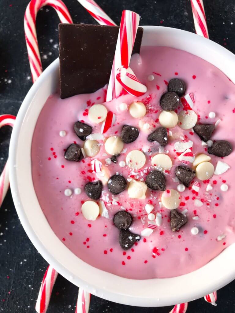 This fast and easy holiday dessert recipe only takes 5 minutes. Peppermint Bark Cream Cheese Dip is a great Christmas dessert made of cream cheese, crushed candy canes, milk and white chocolate, and peppermint. Vegetarian and gluten free. #christmasdessert #christmasrecipe #peppermint