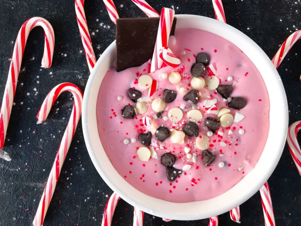 This fast and easy holiday dessert recipe only takes 5 minutes. Peppermint Bark Cream Cheese Dip is a great Christmas dessert made of cream cheese, crushed candy canes, milk and white chocolate, and peppermint. Vegetarian and gluten free. #christmasdessert #christmasrecipe #peppermint