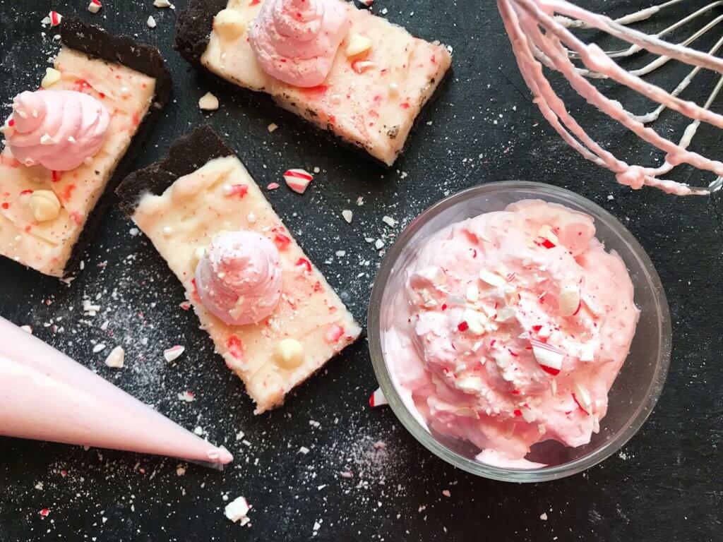 A fast and simple 5 minute whipped cream. Peppermint Whipped Cream is made with just three ingredients for your holiday desserts. #holidaydesserts #easydesserts #whippedcream #whipcream #peppermint