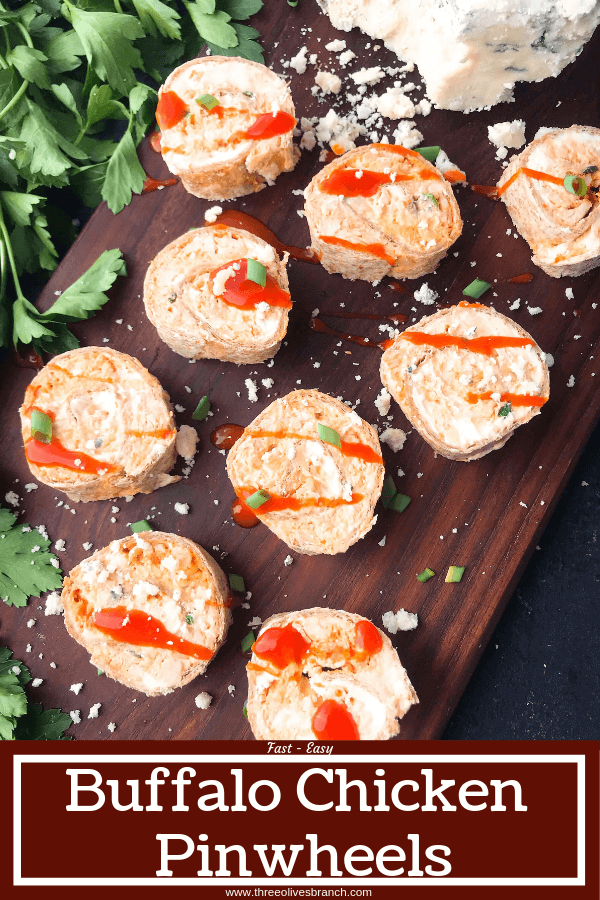 Classic buffalo chicken wing flavors in a finger food appetizer. Buffalo Chicken Pinwheel Roll Ups filled with cream cheese, blue cheese, shredded chicken, and buffalo wing sauce rolled up in a tortilla. Simple, fast, and easy game day tailgating recipe. #gamedayrecipes #buffalowing #buffalochicken