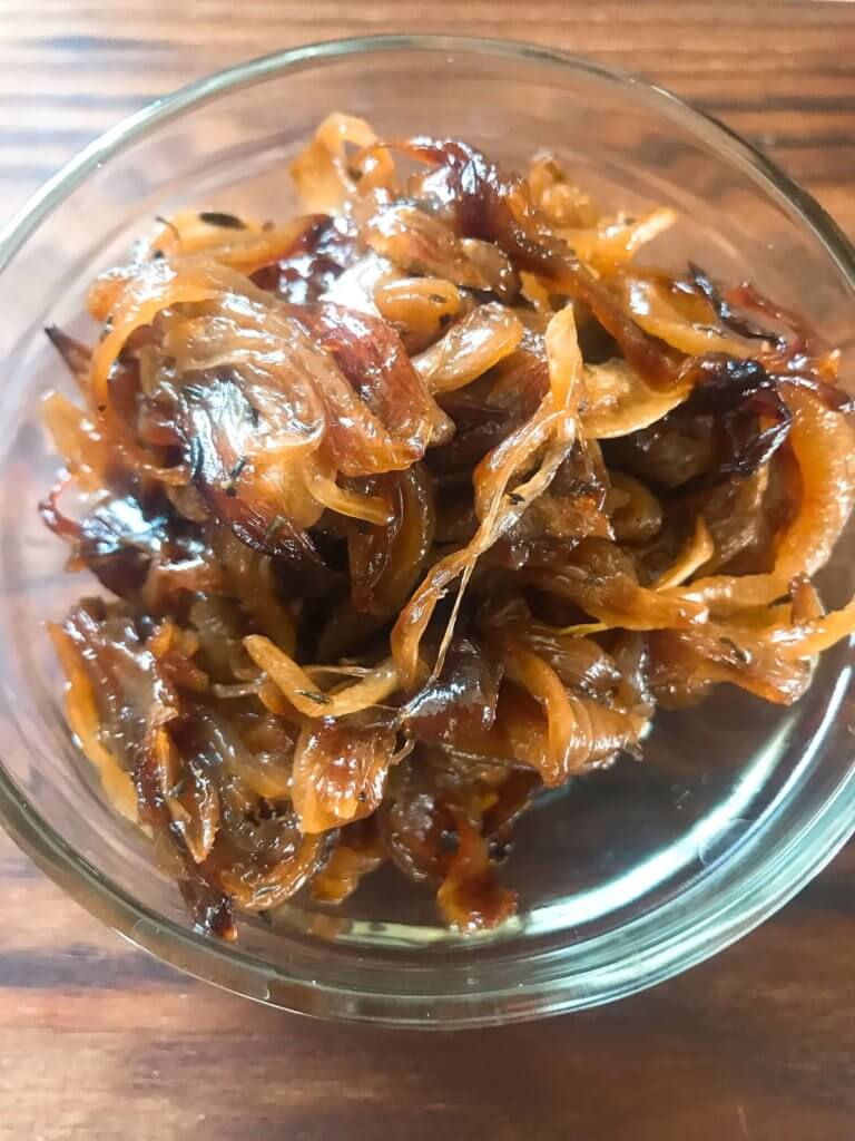 Learn How to Caramelize Onions. A simple recipe ready in 30 minutes, the onions are gluten free, vegan, vegetarian, paleo, and Whole 30. A perfect condiment to top on just about anything!