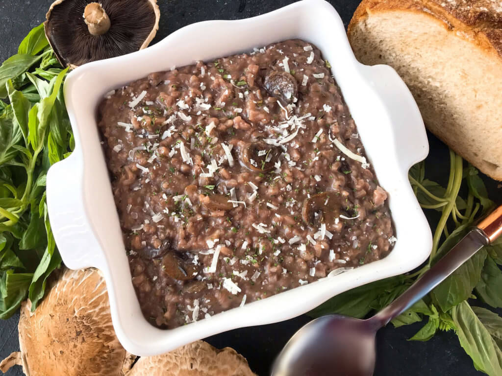 An Italian comfort food recipe. Mushroom Red Wine Risotto with Parmesan Cheese is vegetarian and gluten free (gf) but also great with chicken, steak, or sausage. Arborio rice, red wine, mushroom, Parmesan, and rosemary. #italianrecipes #risotto #comfortfood