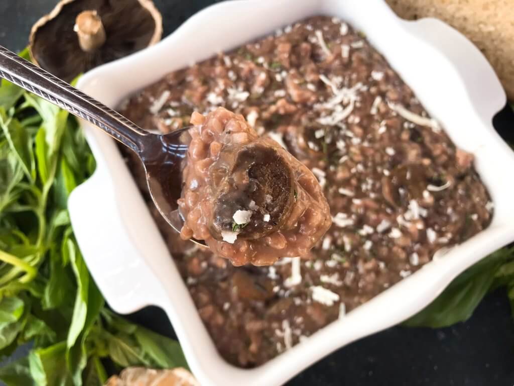 An Italian comfort food recipe. Mushroom Red Wine Risotto with Parmesan Cheese is vegetarian and gluten free (gf) but also great with chicken, steak, or sausage. Arborio rice, red wine, mushroom, Parmesan, and rosemary. #italianrecipes #risotto #comfortfood