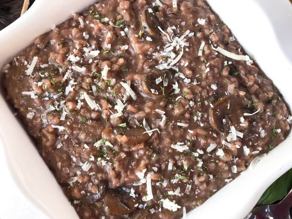 An Italian comfort food recipe. Mushroom Red Wine Risotto with Parmesan Cheese is vegetarian and gluten free (gf) but also great with chicken, steak, or sausage. Arborio rice, red wine, mushroom, Parmesan, and rosemary. #italianrecipes #risotto #comfortfood