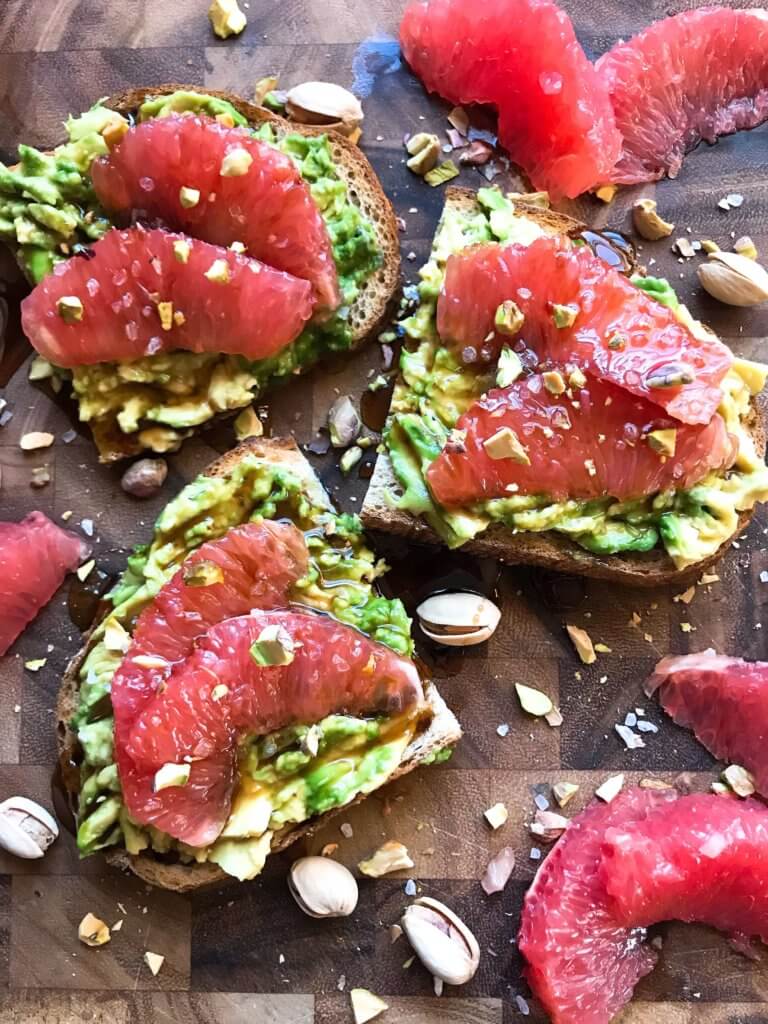 A quick and simple vegan breakfast or brunch recipe ready in just a few minutes. Balsamic Grapefruit Avocado Toast sprinkled with chopped pistachios. #avocadotoast #breakfastrecipes #veganbreakfast