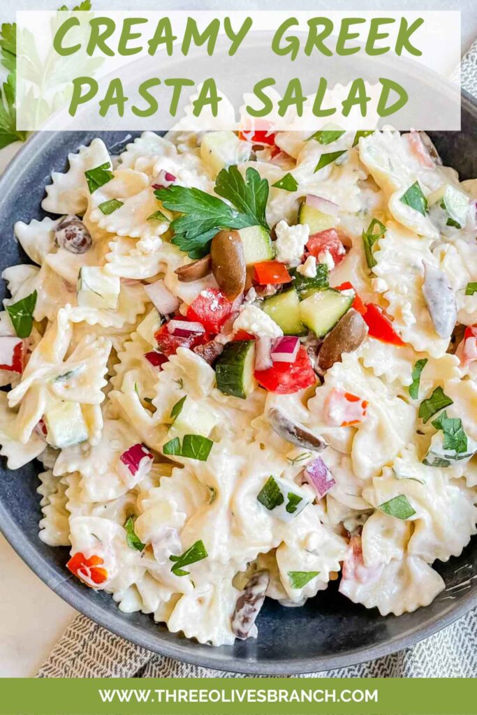 Pin of Creamy Greek Tzatziki Pasta Salad in a gray bowl with title at top