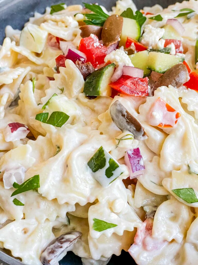 A close up view of the Creamy Greek Tzatziki Pasta Salad