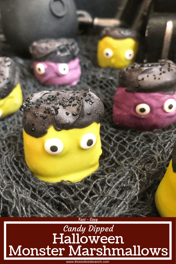 Simple and easy Halloween treat dessert recipe. Halloween Candy Dipped Monster Marshmallows are large marshmallows dunked in colored candy melts with sprinkles and candy eyes for your Halloween party. #halloweenfood #halloweenrecipes #halloweenparty #monsterparty