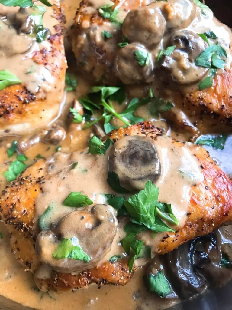 Skillet Chicken Marsala is a one pot meal ready in just 30 minutes. A quick and simple dinner recipe great with potatoes, pasta, rice, and vegetables. Chicken breasts cooked with Marsala wine sauce and mushrooms. Gluten free. #chickenrecipes #chickendinner #chickenmarsala #30minutemeals