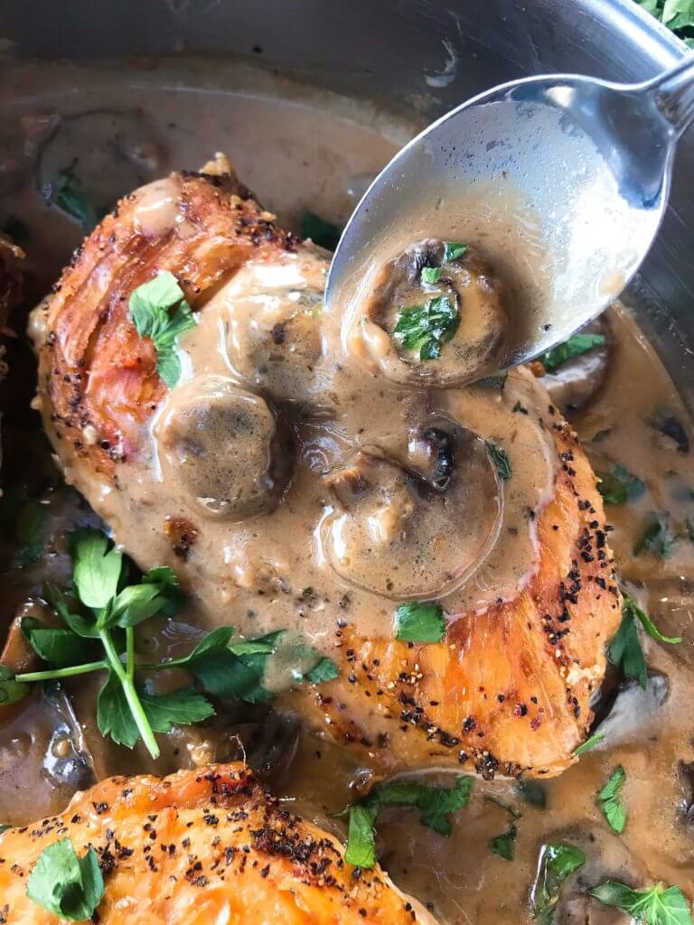 Skillet Chicken Marsala is a one pot meal ready in just 30 minutes. A quick and simple dinner recipe great with potatoes, pasta, rice, and vegetables. Chicken breasts cooked with Marsala wine sauce and mushrooms. Gluten free. #chickenrecipes #chickendinner #chickenmarsala #30minutemeals