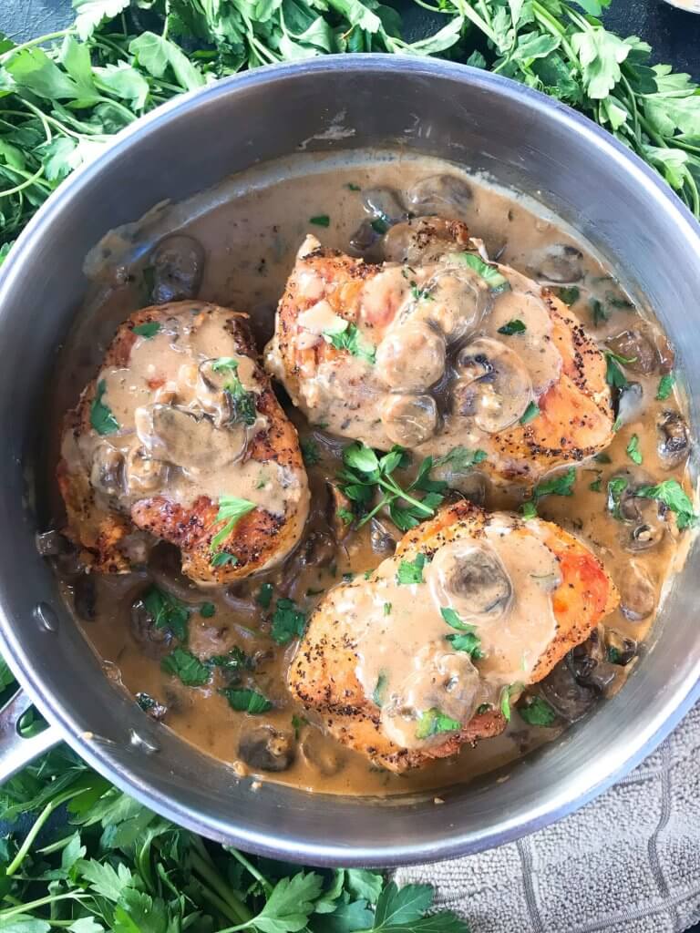 Skillet Chicken Marsala is a one pot meal ready in just 30 minutes. A quick and simple dinner recipe great with potatoes, pasta, rice, and vegetables. Chicken breasts cooked with Marsala wine sauce and mushrooms. Gluten free. #chickenrecipes #chickendinner #chickenmarsala #30minutemeals