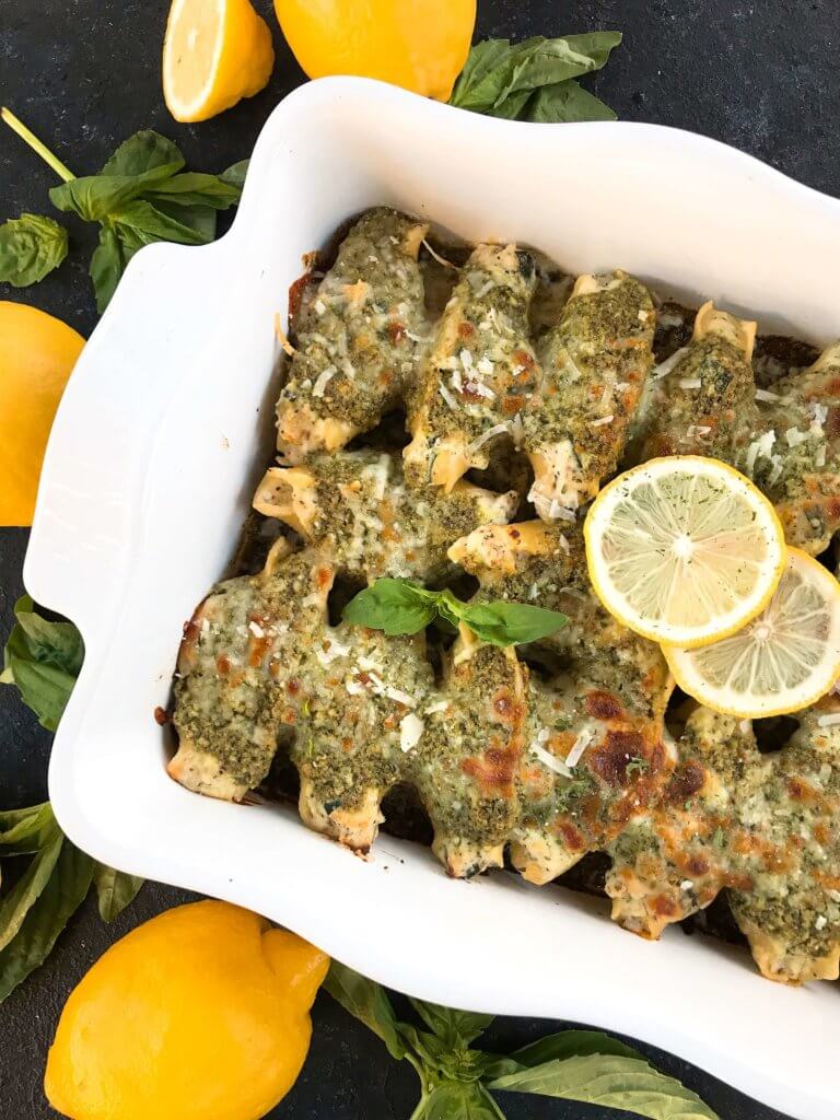 Fresh and bright flavors in a classic Italian dinner recipe. Zucchini Lemon Stuffed Shells with Creamy Pesto Sauce are stuffed with zucchini, lemon, ricotta, and Parmesan cheese. Topped with creamy basil pesto sauce. Vegetarian. #italianrecipes #stuffedshells #zucchinirecipes #pesto