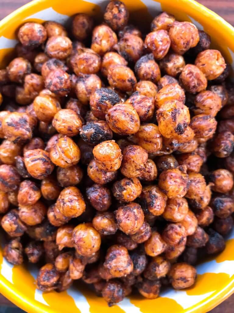 A healthy, vegan, dairy free, gluten free snack or party appetizer recipe. Healthy game day recipe. Simple and easy to make, Spicy Cocoa Espresso Roasted Chickpeas are coated in cayenne pepper, cocoa and coffee. #fingerfood #gamedayrecipes #healthysnacks