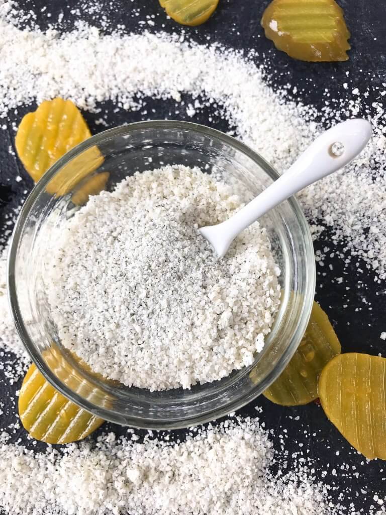 Dill Pickle Flavored Salt is a quick and easy seasoning for grilling and BBQ. Vegan, vegetarian, gluten free, and dairy free recipe. Good on chicken, pork, vegetables, and more. #flavoredsalt #seasoningsalt #pickles