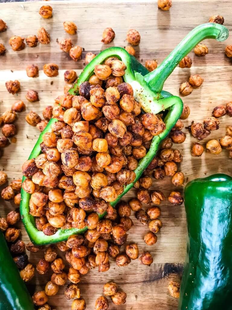 Taco Roasted Chickpeas are a healthy and simple snack recipe! Great for game day and entertaining appetizer, garbanzo beans are roasted and tossed with Mexican spices of chili powder, cumin, and cayenne. Vegan, vegetarian, gluten free, dairy free. #roastedchickpeas #healthysnack