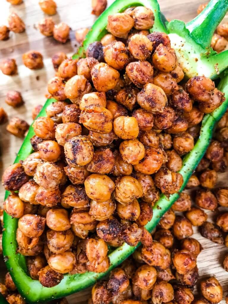 Taco Roasted Chickpeas are a healthy and simple snack recipe! Great for game day and entertaining appetizer, garbanzo beans are roasted and tossed with Mexican spices of chili powder, cumin, and cayenne. Vegan, vegetarian, gluten free, dairy free. #roastedchickpeas #healthysnack