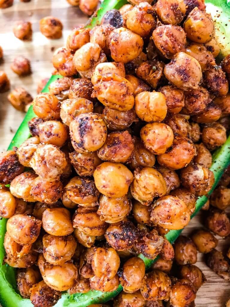 Taco Roasted Chickpeas are a healthy and simple snack recipe! Great for game day and entertaining appetizer, garbanzo beans are roasted and tossed with Mexican spices of chili powder, cumin, and cayenne. Vegan, vegetarian, gluten free, dairy free. #roastedchickpeas #healthysnack