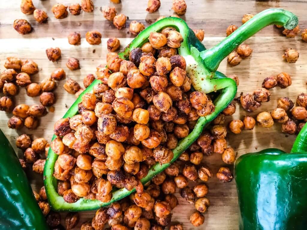 Taco Roasted Chickpeas are a healthy and simple snack recipe! Great for game day and entertaining appetizer, garbanzo beans are roasted and tossed with Mexican spices of chili powder, cumin, and cayenne. Vegan, vegetarian, gluten free, dairy free. #roastedchickpeas #healthysnack