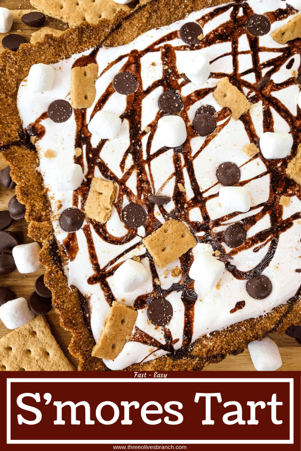 A S'mores Tart for summer dessert recipes. A graham cracker crust is filled with melted chocolate, marshmallow fluff, and s'mores ingredients. Simple and easy. #smores #tartrecipe