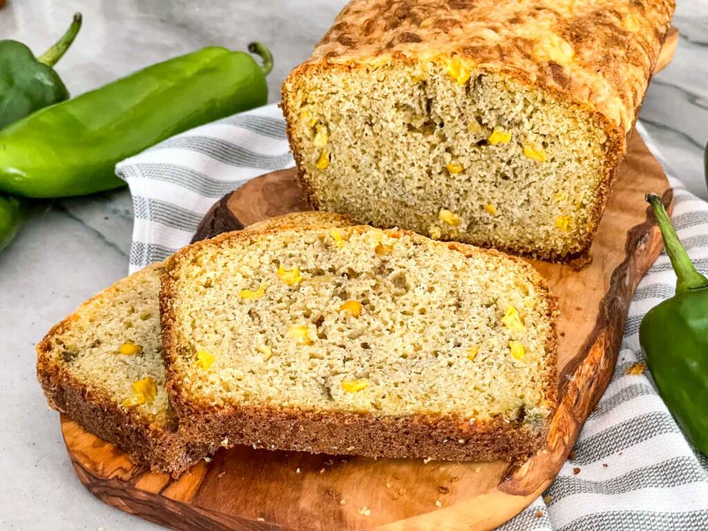 Slices of Hatch Green Chile Cheddar Cornbread on a board