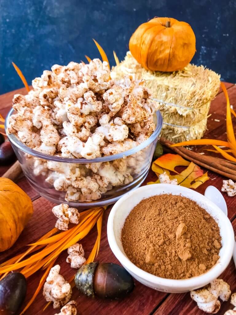 This Homemade Pumpkin Spice Popcorn is ready in just 10 minutes! A sweet and savory pumpkin spice is sprinkled across fresh homemade popcorn for a fast and easy snack recipe. Gluten free, vegan, and vegetarian. #pumpkinspice #fallsnacks #fallrecipes