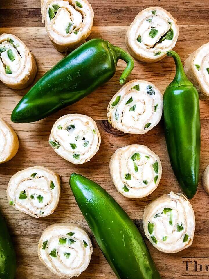 Just 20 minutes to make these Jalapeno Popper Pinwheels, a great game day or party appetizer recipe. Cream cheese mixture is blended with more cheese, spices, and diced jalapeno peppers for a twist on a classic. Vegetarian. #gamedayrecipe #rollups #pinwheels #appetizerrecipes Just 20 minutes to make these Jalapeno Popper Pinwheels, a great game day or party appetizer recipe. Cream cheese mixture is blended with more cheese, spices, and diced jalapeno peppers for a twist on a classic. Vegetarian. #gamedayrecipe #rollups #pinwheels #appetizerrecipes