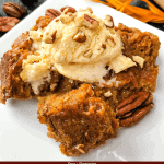 Pin of a Pumpkin Bread Pudding portion on a white plate with title