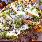 Pin of top view of Keto Low Carb Cheesy Chicken Pesto Spaghetti Squash with title