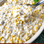 Pin of a spoon scooping some Hatch Green Chile Creamed Corn with title